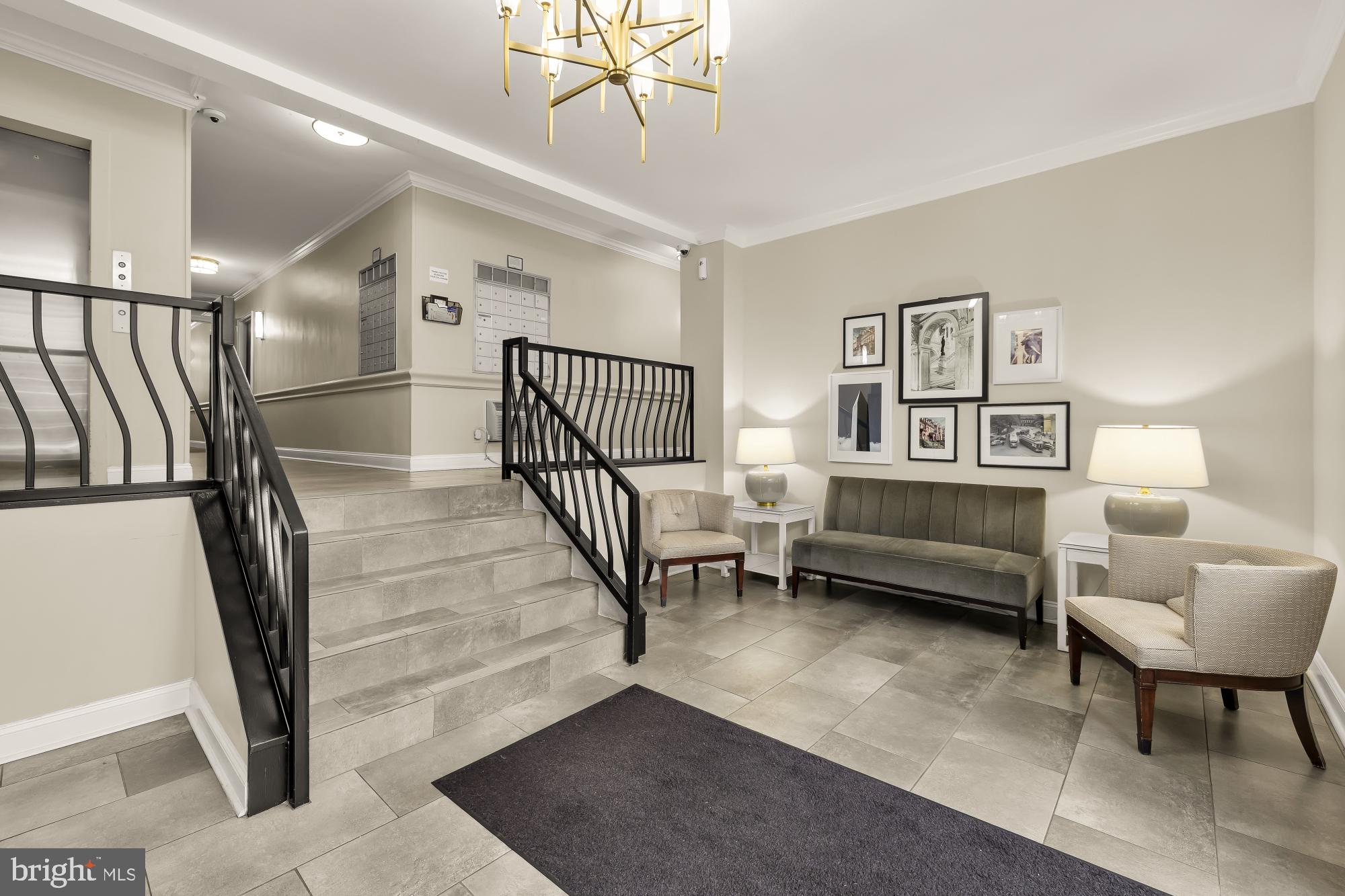 2130 N Street Northwest, Unit 407 Washington, DC 20037 - Photo 6 of 31 a living room with furniture and a night stand