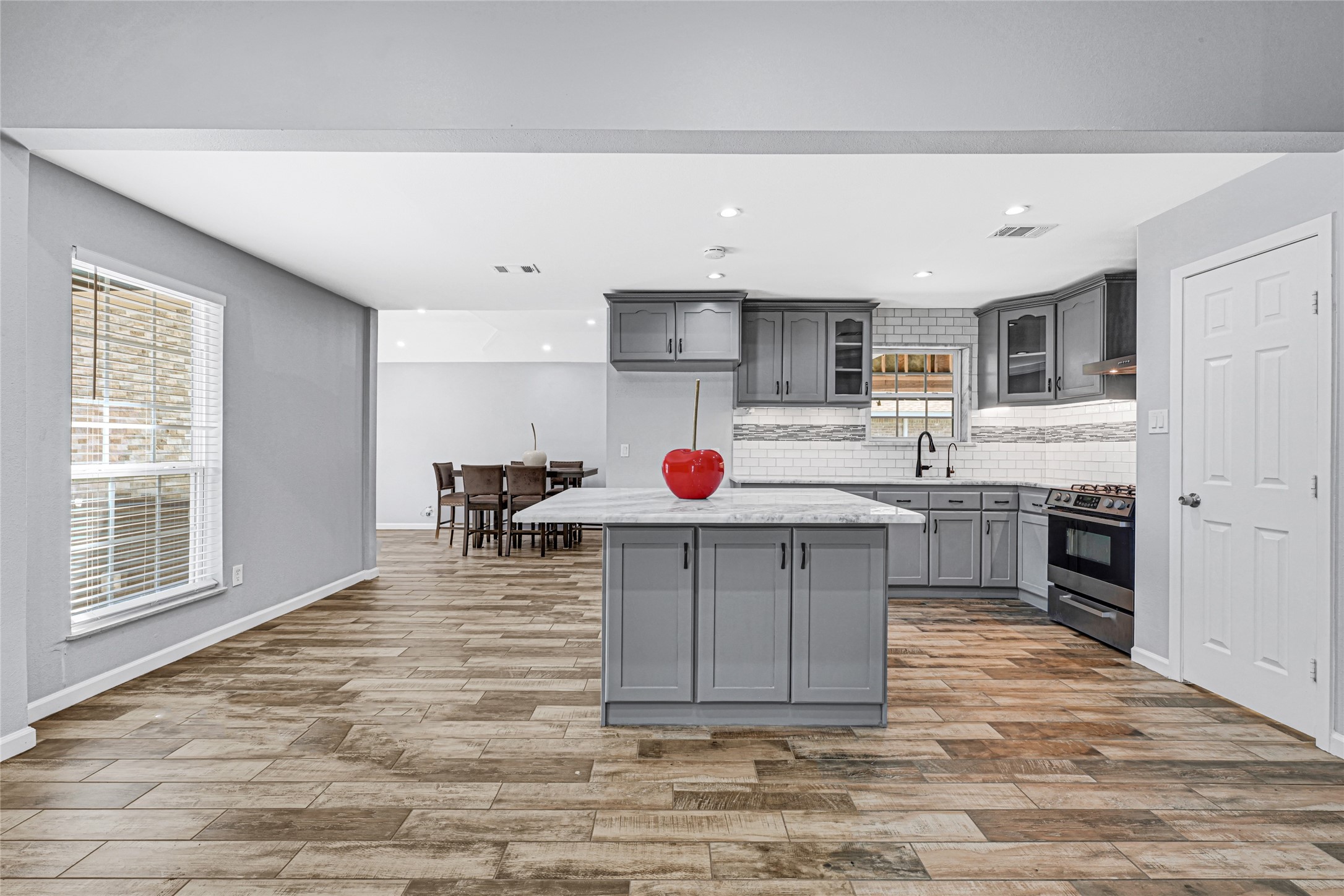 3603 Beau Lane Houston, TX 77039 - Photo 11 of 22 a kitchen that has a lot of cabinets in it and appliances