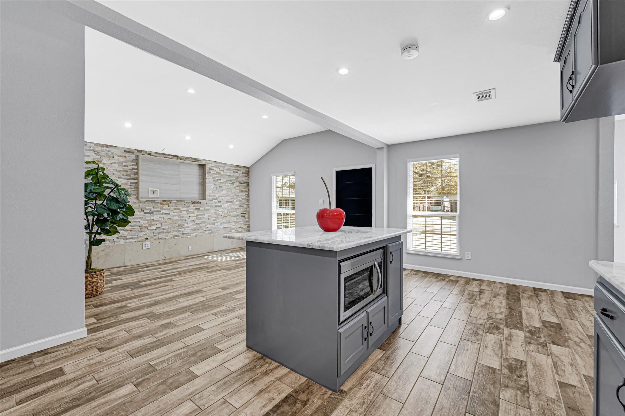 3603 Beau Lane Houston, TX 77039 - Photo 13 of 22 a kitchen with stainless steel appliances granite countertop a stove and a wooden floors