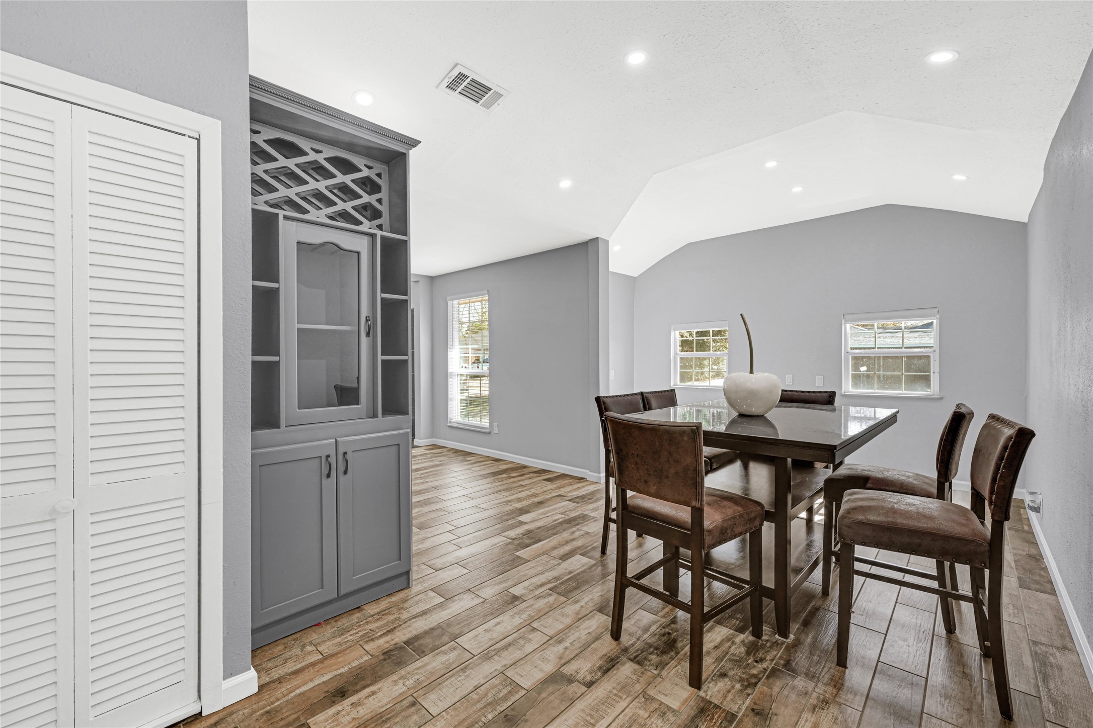 3603 Beau Lane Houston, TX 77039 - Photo 15 of 22 a view of a dining room with furniture and wooden floor