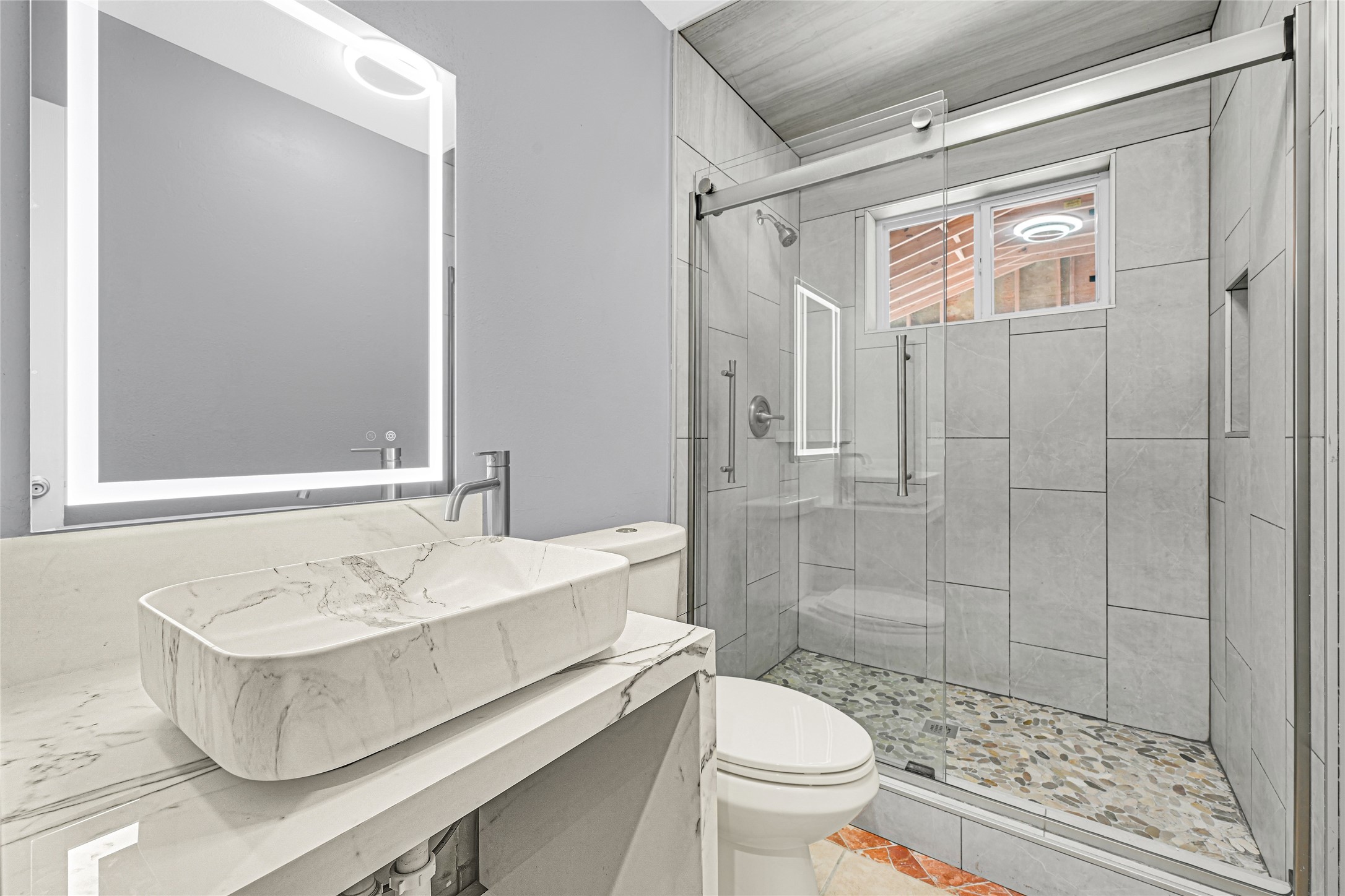 3603 Beau Lane Houston, TX 77039 - Photo 17 of 22 a bathroom with a sink toilet and shower