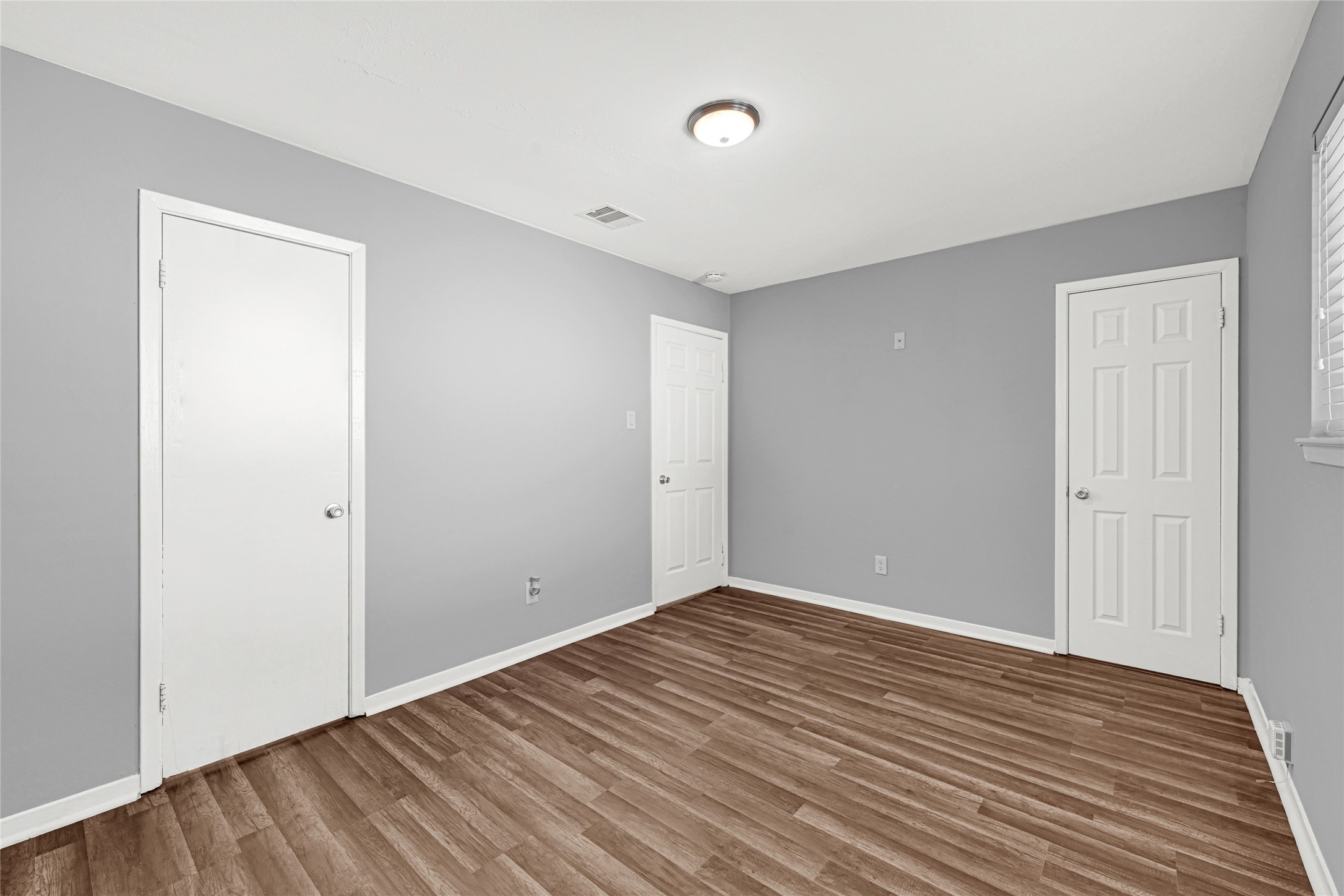 3603 Beau Lane Houston, TX 77039 - Photo 20 of 22 a view of an empty room with wooden floor
