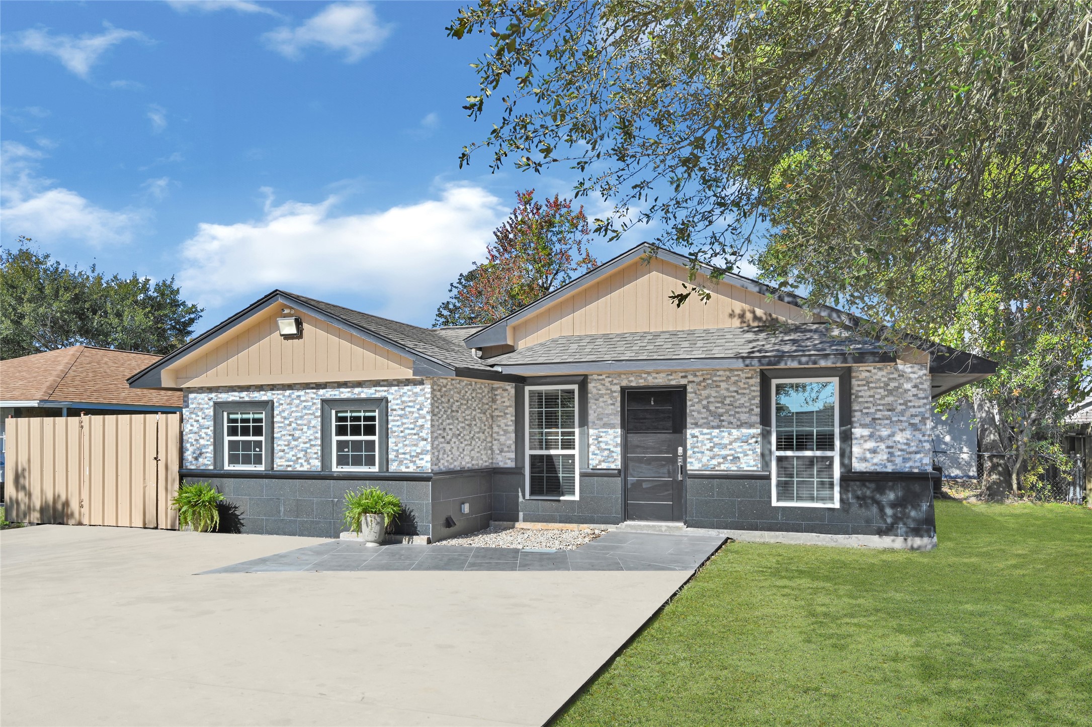 3603 Beau Lane Houston, TX 77039 - Photo 3 of 22 a front view of a house with a garden and yard