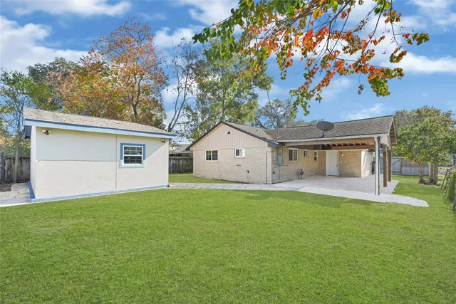 a house view with a garden space