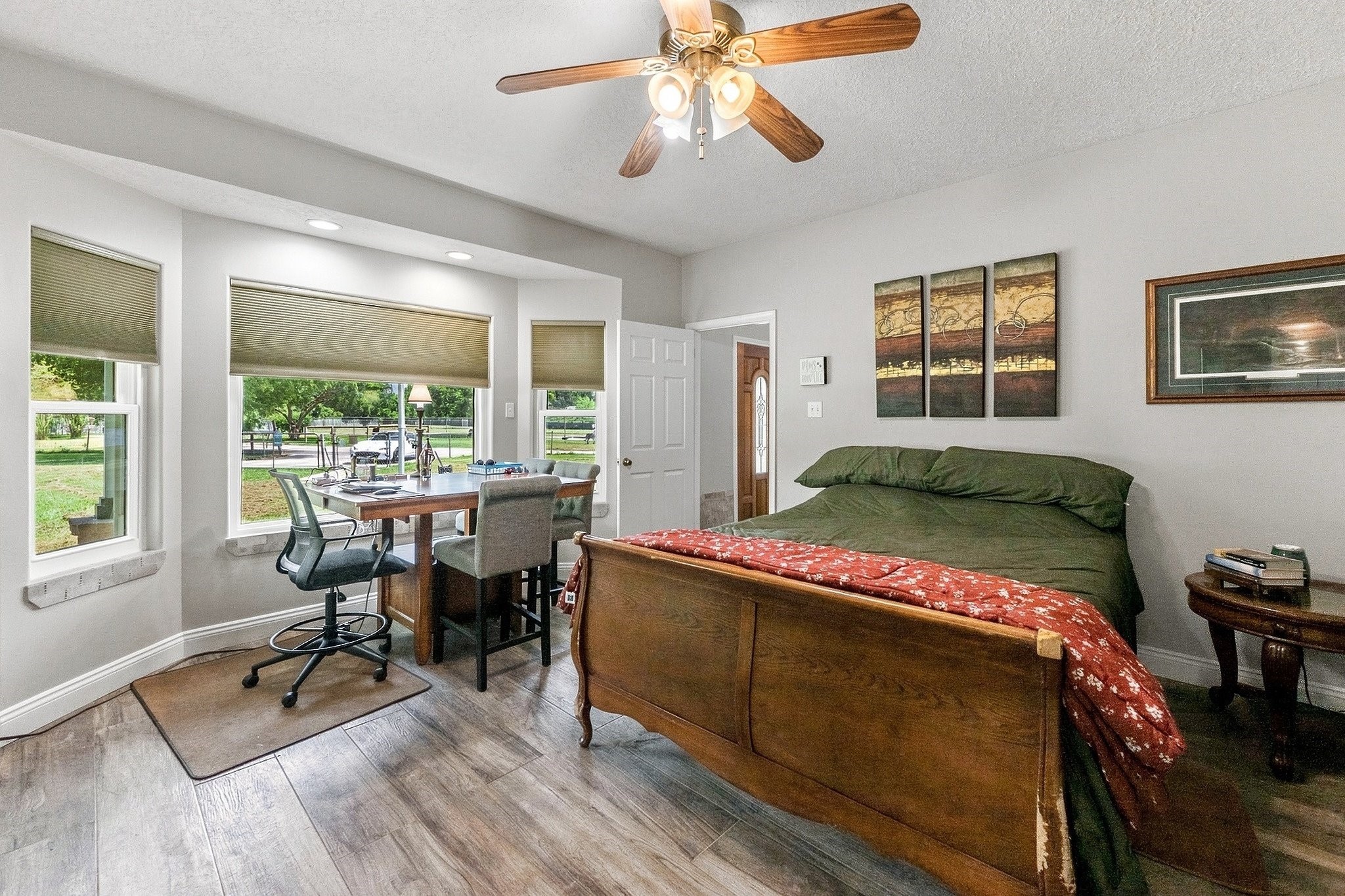 9010 Point Barrow Road Beach City, TX 77523 - Photo 22 of 50 A second primary suite on the main level gives the home exceptional flexibility, offering a full-scale bedroom retreat ideal for multi-generational living, long-term guests or a private secondary owner’s suite.