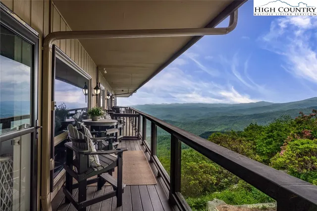 a view of swimming pool from a balcony