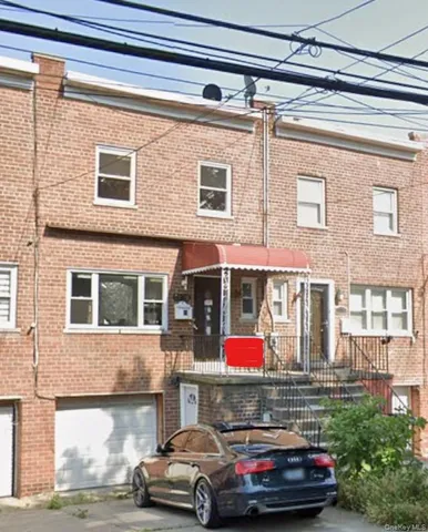 a car parked in front of a building