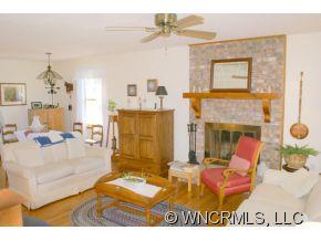 28 Hampton Road Leicester, NC 28748 - Photo 4 of 22 a living room with furniture and a fireplace