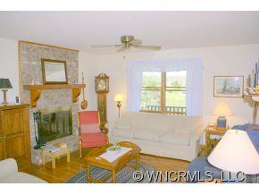 28 Hampton Road Leicester, NC 28748 - Photo 5 of 22 a bedroom with furniture and a window