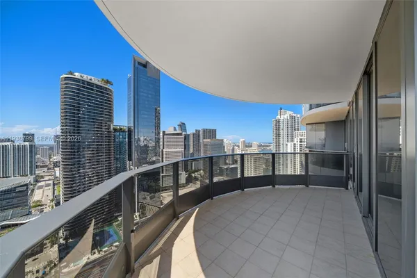 a view of a balcony with city view