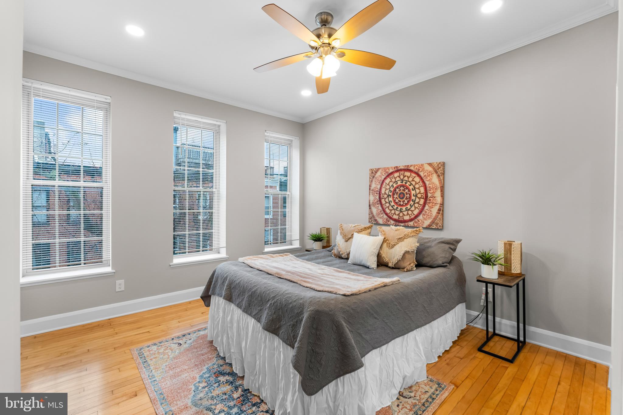 1261 Riverside Avenue Baltimore, MD 21230 - Photo 17 of 60 a bedroom with a bed and a window