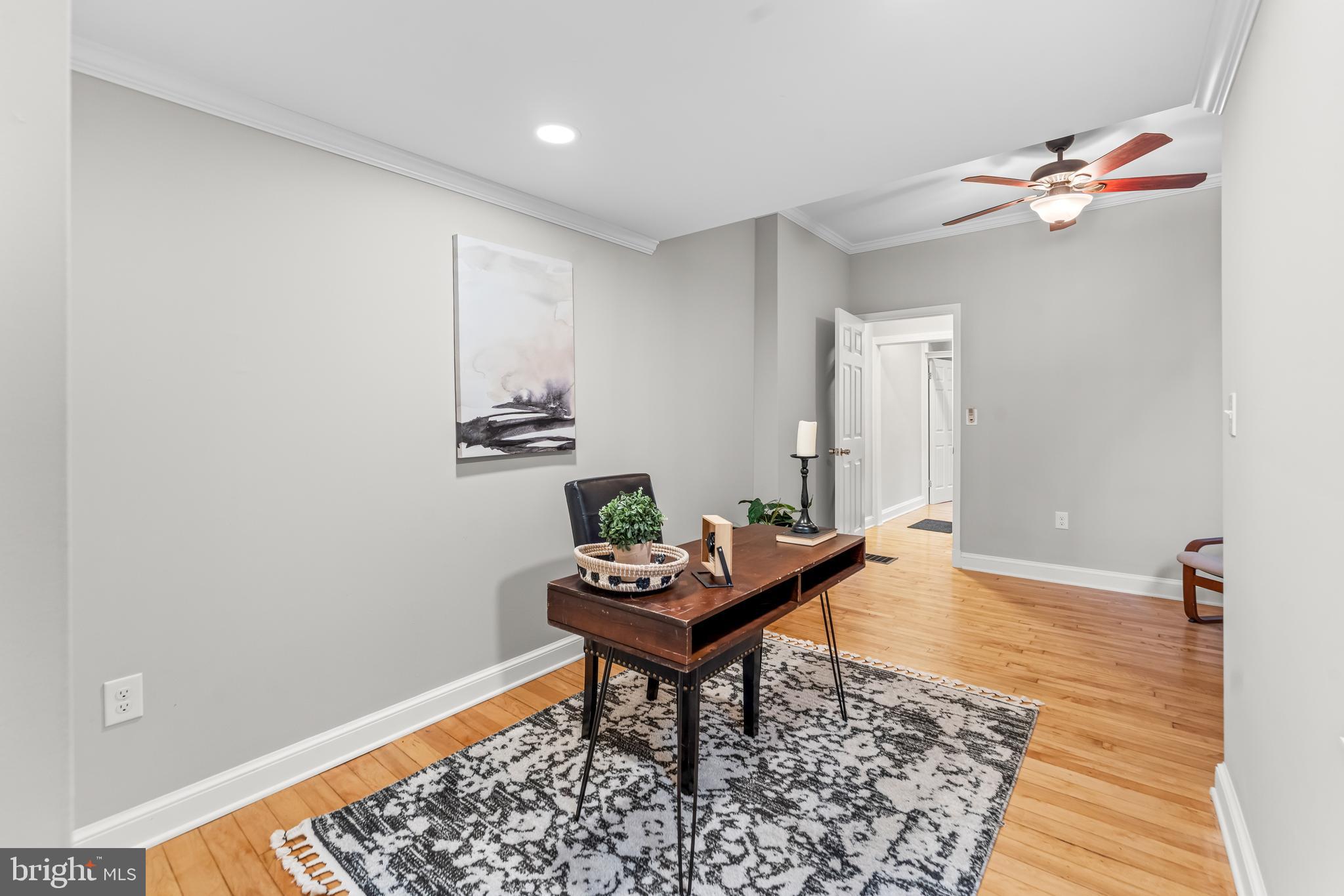 1261 Riverside Avenue Baltimore, MD 21230 - Photo 22 of 60 a living room with furniture and a rug