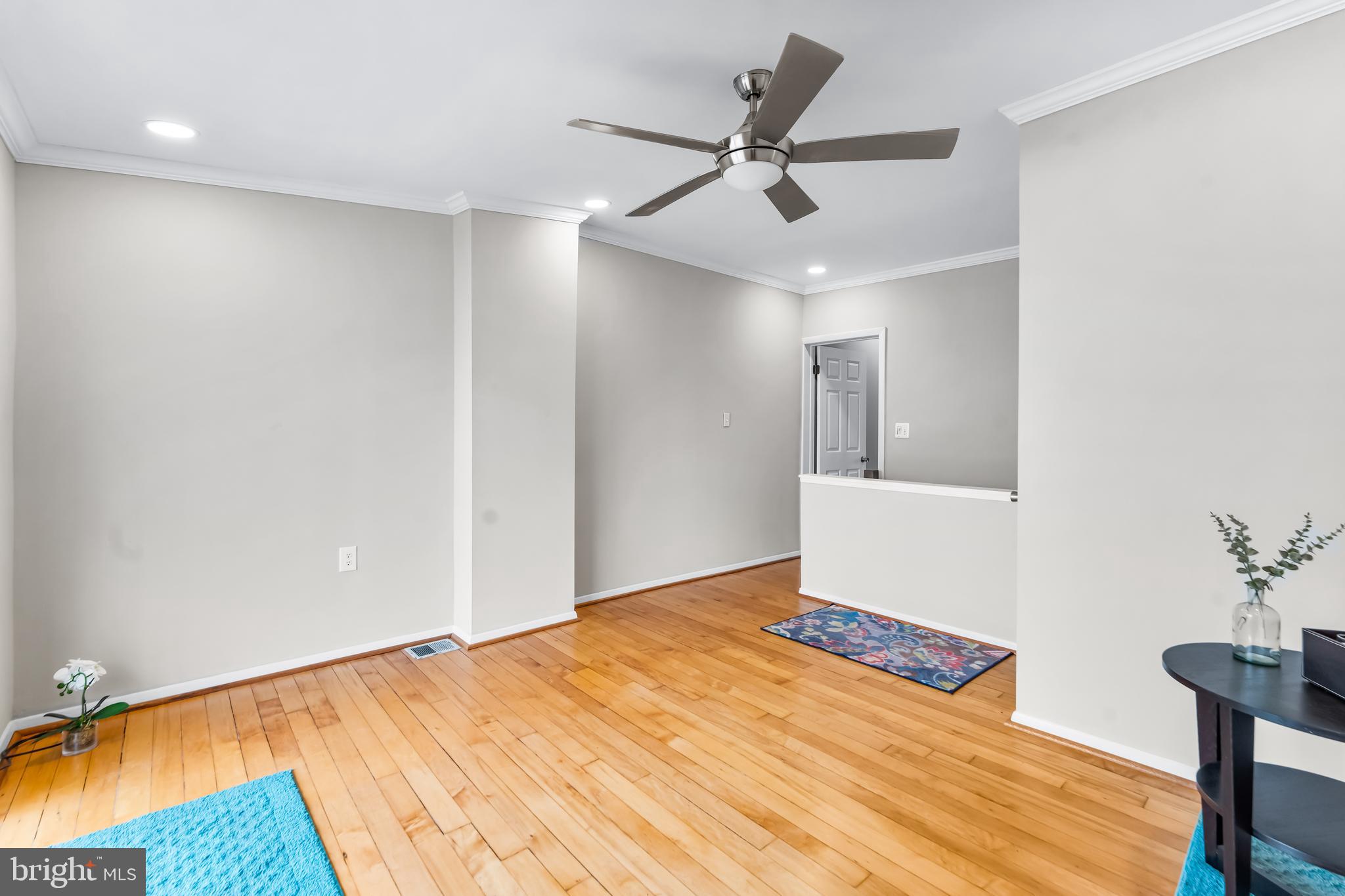 1261 Riverside Avenue Baltimore, MD 21230 - Photo 28 of 60 a bedroom with a bed and a chandelier