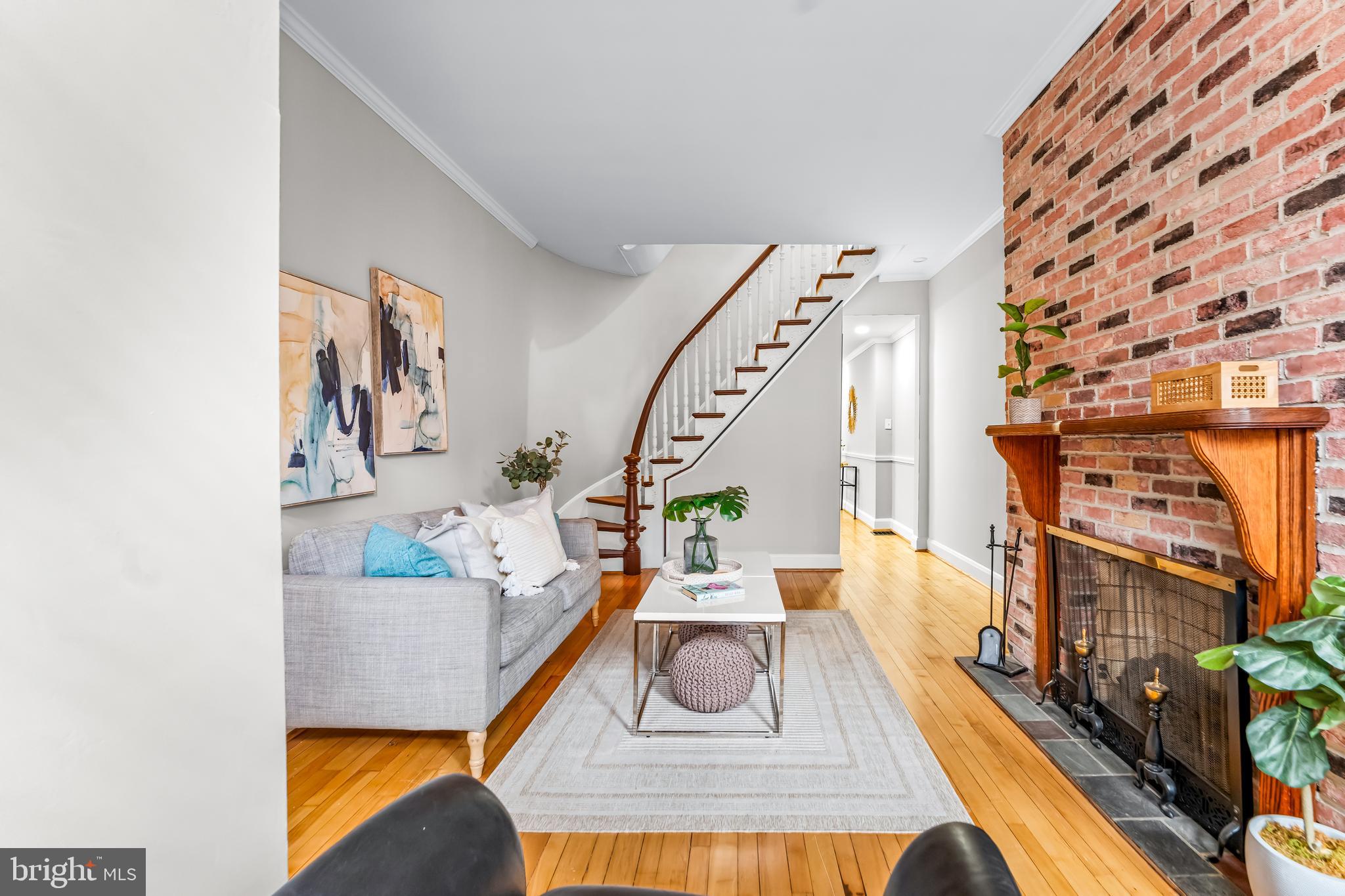 1261 Riverside Avenue Baltimore, MD 21230 - Photo 3 of 60 a living room with furniture and a wooden floor
