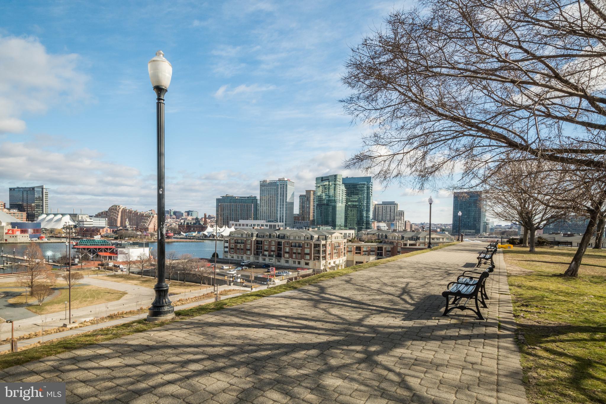 1261 Riverside Avenue Baltimore, MD 21230 - Photo 43 of 60 a view of a swimming pool with a lounge chairs