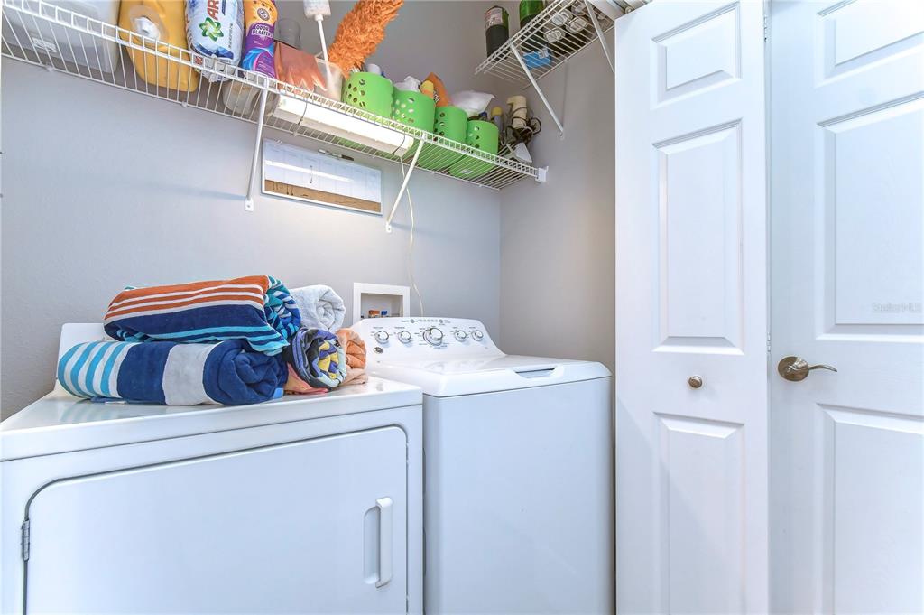 8507 Sandpiper Ridge Avenue Tampa, FL 33647 - Photo 18 of 48 a utility room with dryer and washer