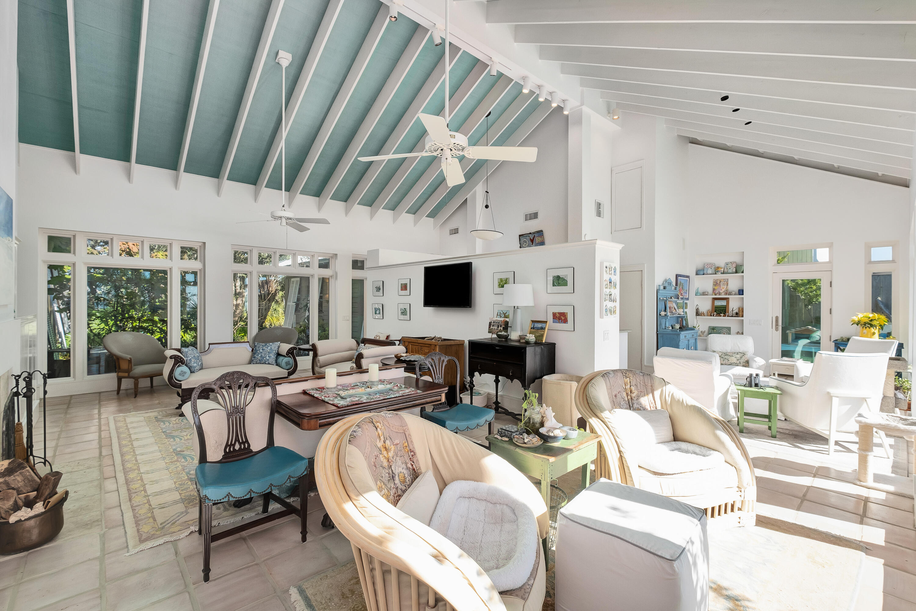 800 Blue Mountain Road Santa Rosa Beach, FL 32459 - Photo 13 of 71 a living room with furniture and a flat screen tv