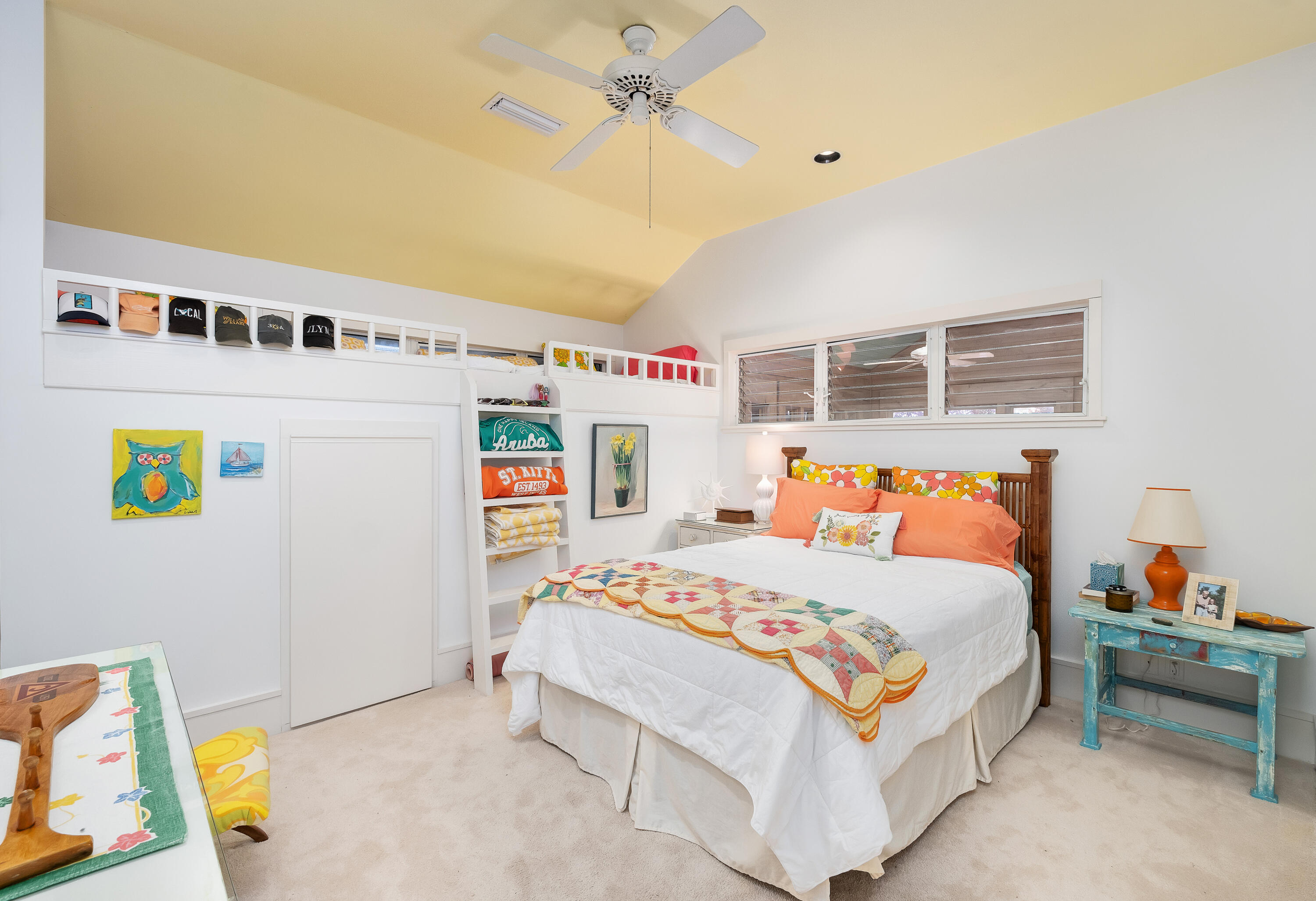 800 Blue Mountain Road Santa Rosa Beach, FL 32459 - Photo 17 of 71 a bedroom with a bed and a chandelier