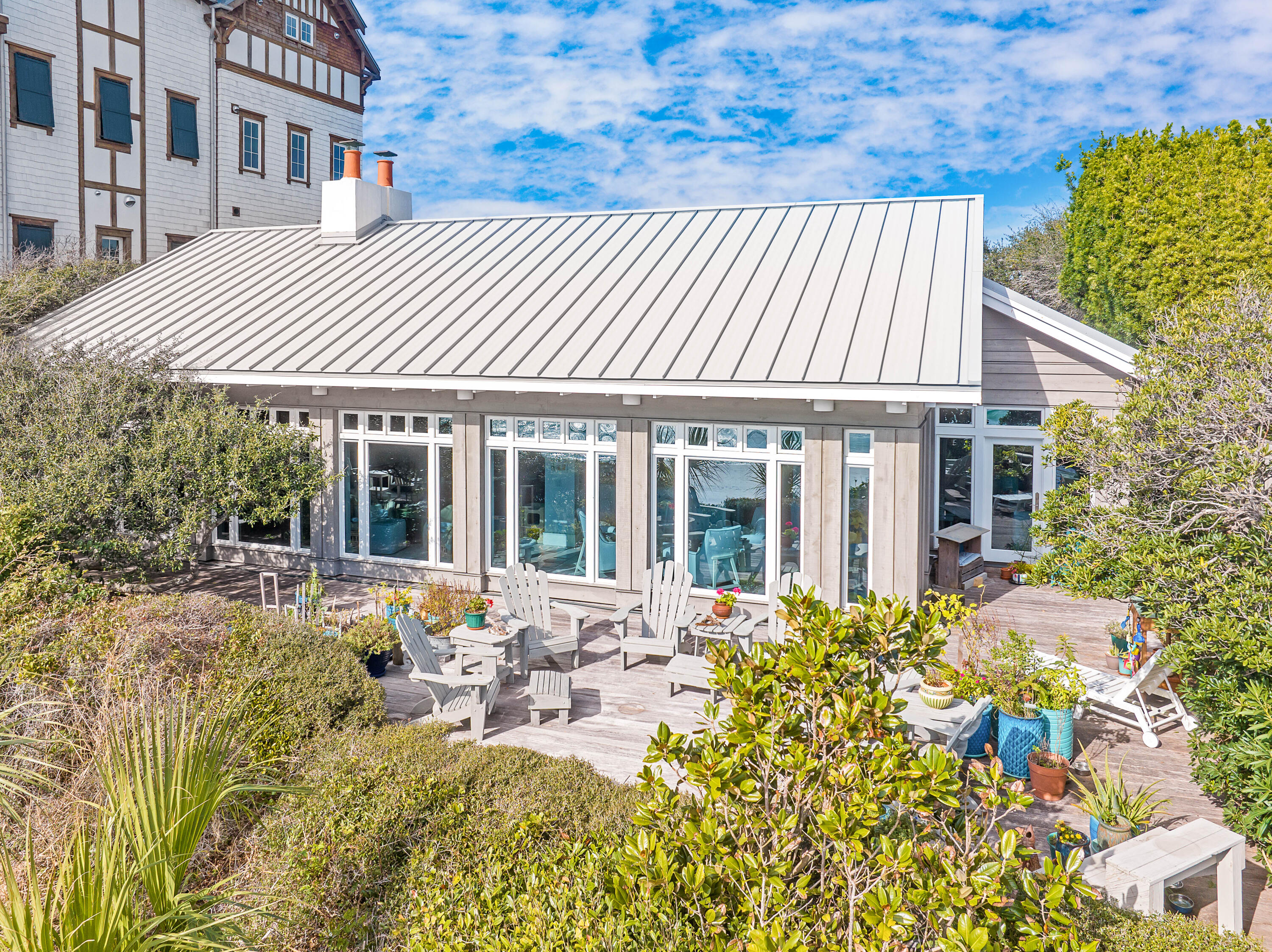 800 Blue Mountain Road Santa Rosa Beach, FL 32459 - Photo 53 of 71 a view of a house with backyard and sitting area