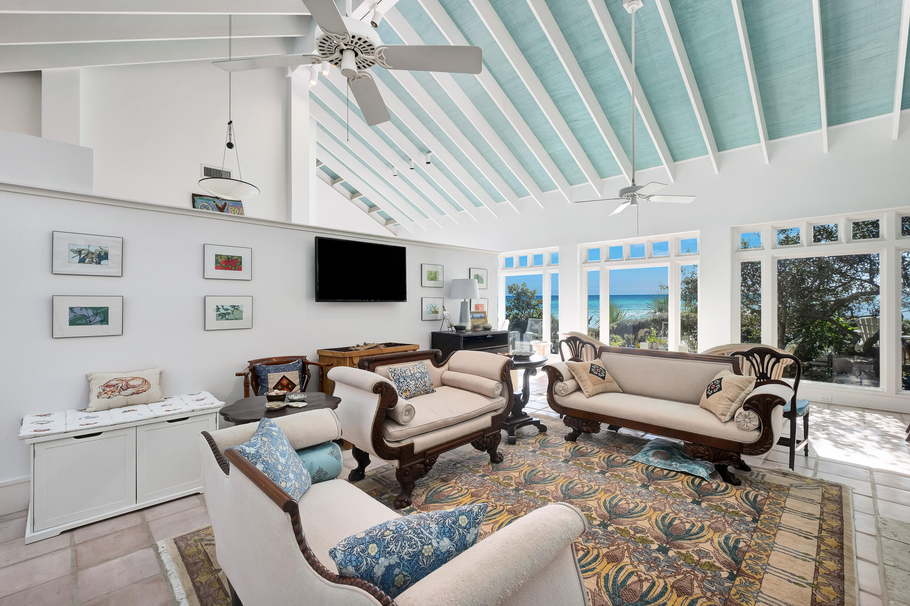 800 Blue Mountain Road Santa Rosa Beach, FL 32459 - Photo 10 of 71 a living room with furniture and a flat screen tv