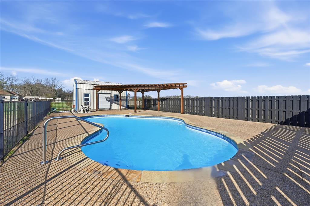 1616 Nash-Howard Road Waxahachie, TX 75165 - Photo 2 of 36 a view of balcony with deck and outdoor seating