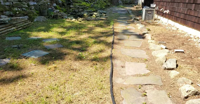 a view of yard with swimming pool