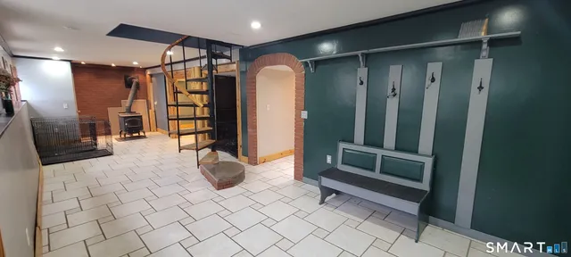 a backyard of a house with seating space