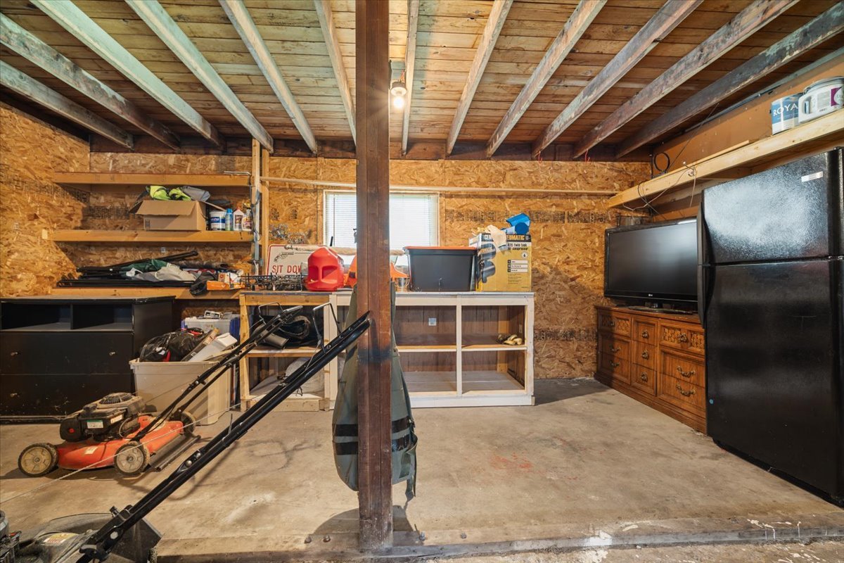 396 North Sherman Street El Paso, IL 61738 - Photo 28 of 29 a view of a storage room with wooden shelves