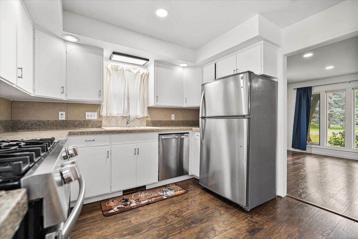 396 North Sherman Street El Paso, IL 61738 - Photo 8 of 29 a kitchen with stainless steel appliances a refrigerator sink and cabinets