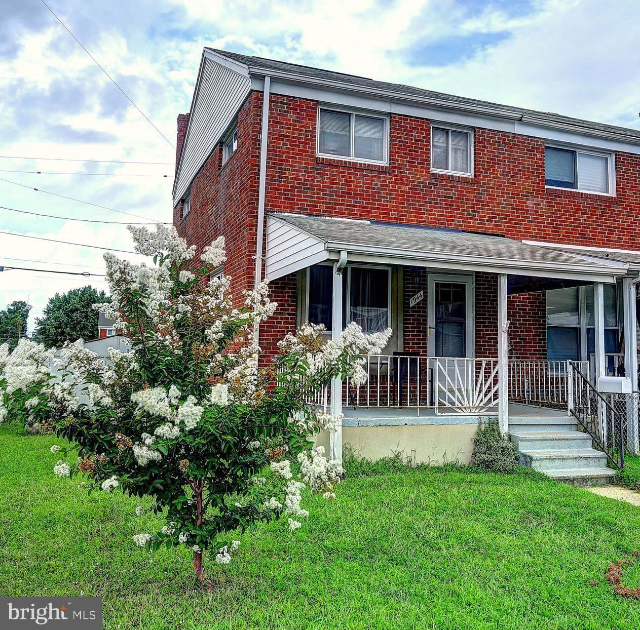 1944 Jasmine Road Baltimore, MD 21222 - Photo 1 of 25 a front view of a house with a yard