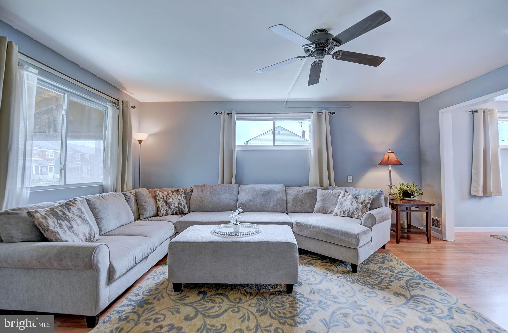1944 Jasmine Road Baltimore, MD 21222 - Photo 4 of 25 a living room with furniture and a window