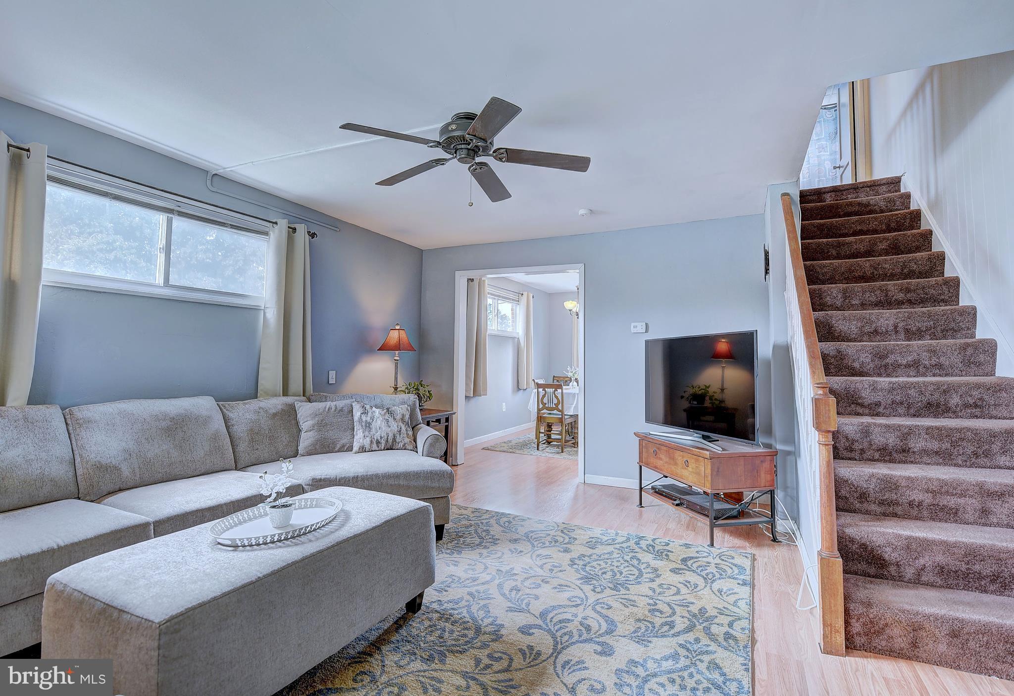 1944 Jasmine Road Baltimore, MD 21222 - Photo 5 of 25 a living room with furniture and a flat screen tv