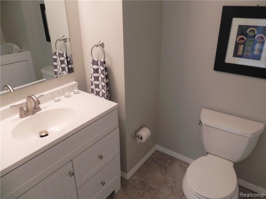 23189 Farmington Road Farmington, MI 48336 - Photo 14 of 29 Updated first floor bathroom w/accessible walk-in tub