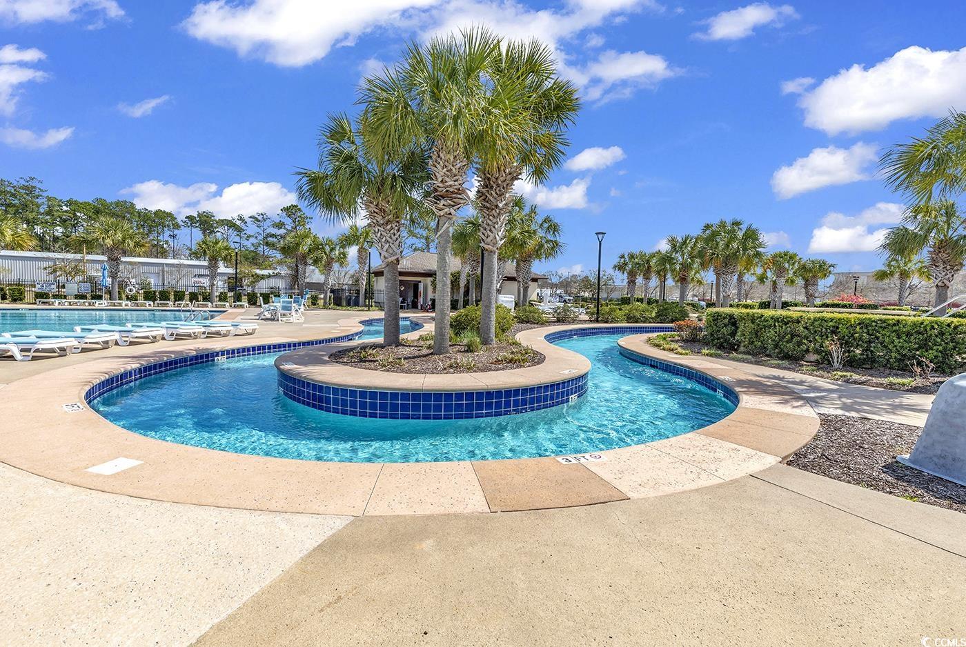 1411 Peterson Street Myrtle Beach, SC 29577 - Photo 37 of 40 Community pool with a patio