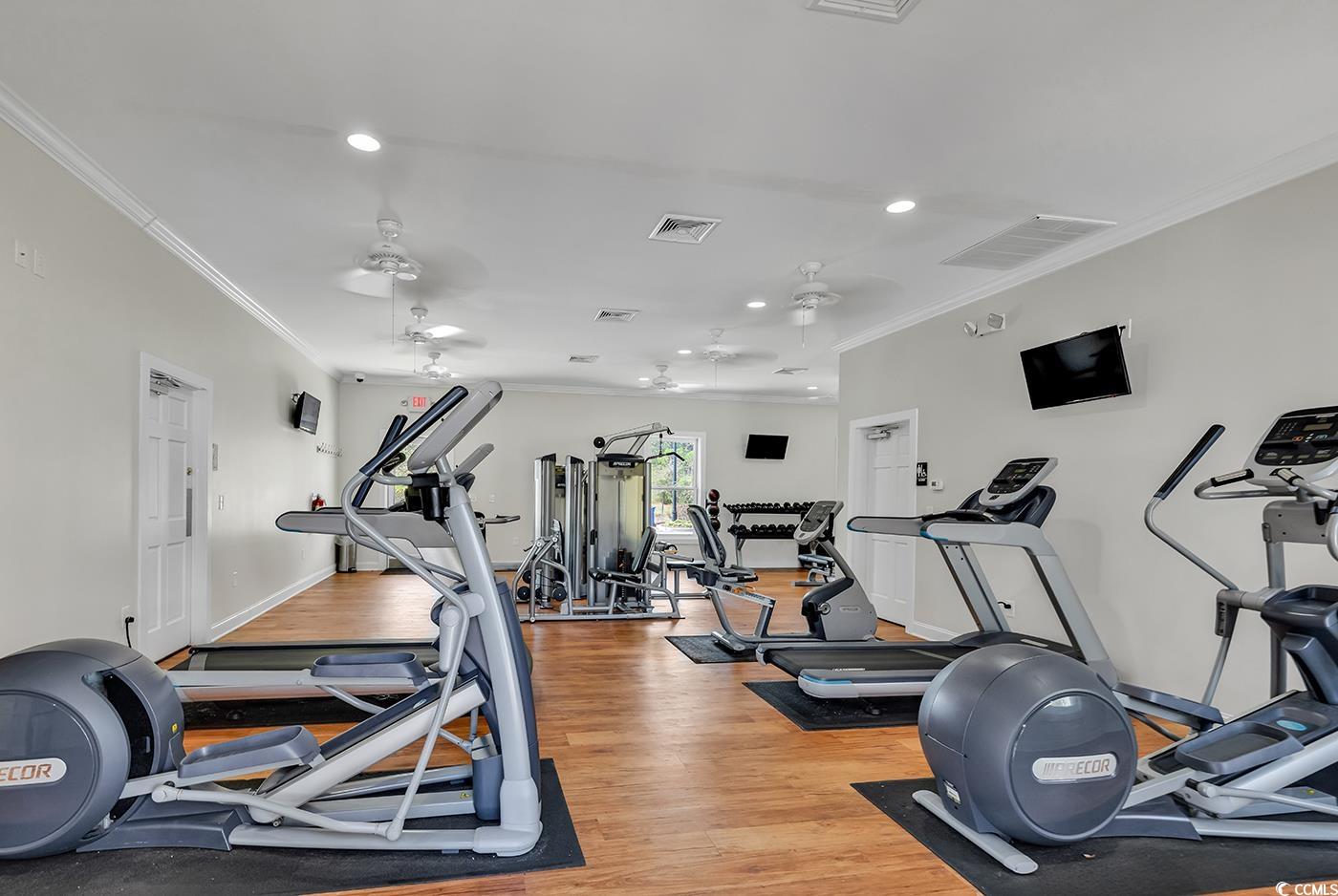 1411 Peterson Street Myrtle Beach, SC 29577 - Photo 40 of 40 Exercise room featuring crown molding, light wood-style floors, and recessed lighting