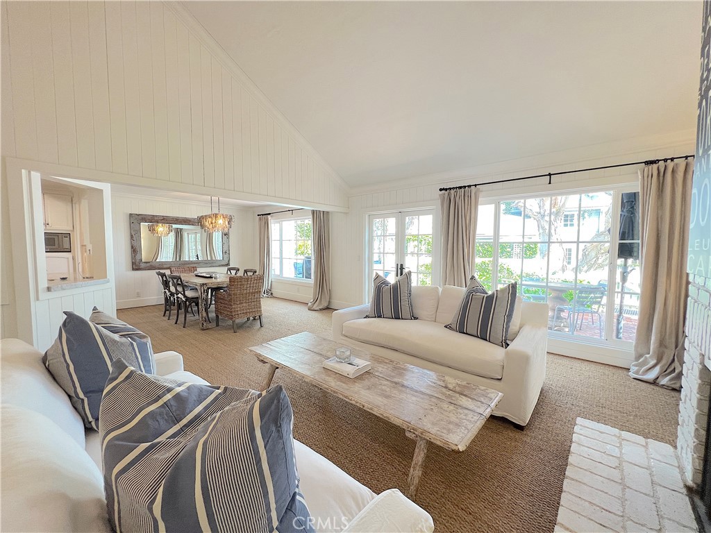 33908 Cape Cove Dana Point, CA 92629 - Photo 11 of 71 a living room with furniture and a table