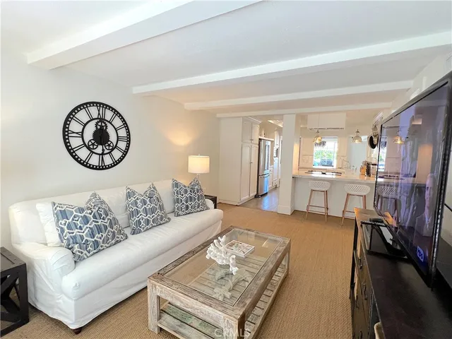 a bedroom with a bed and a night stand