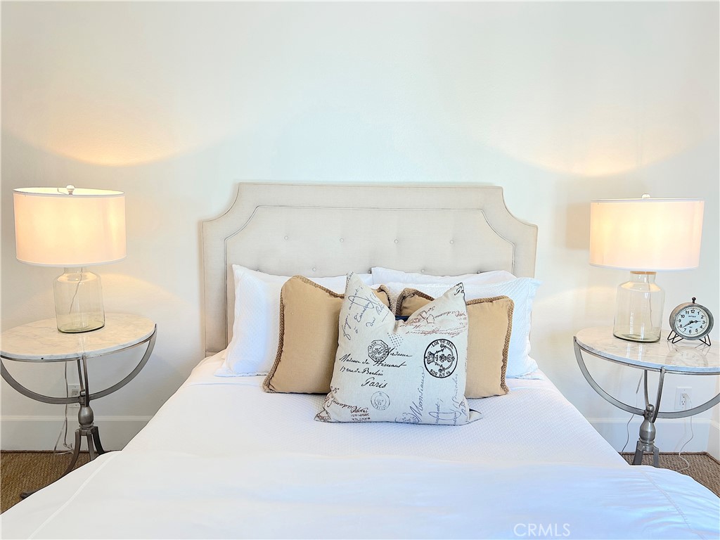 33908 Cape Cove Dana Point, CA 92629 - Photo 34 of 71 a bedroom with a bed and chair