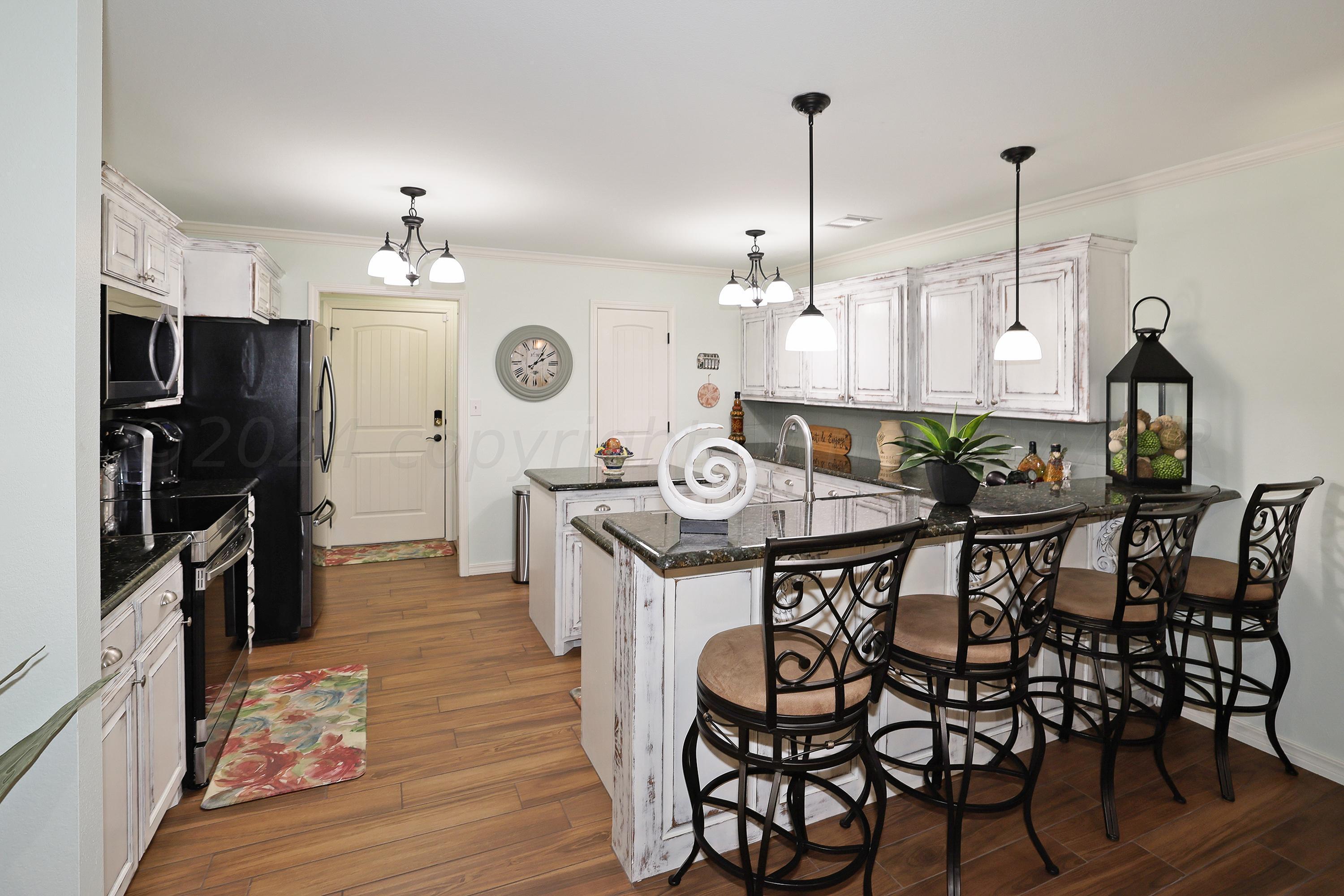 6807 Mosley Street Amarillo, TX 79119 - Photo 10 of 27 10-Kitchen