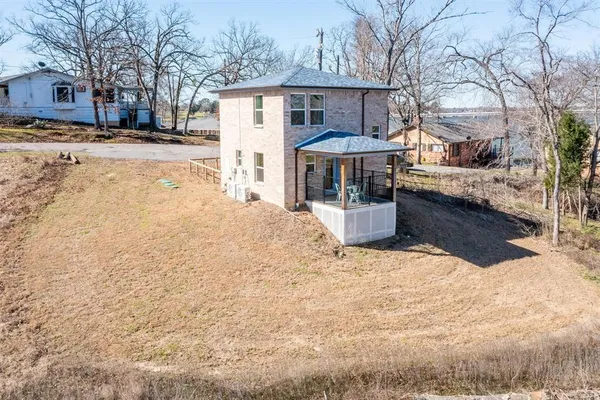 a large tree in front of a building