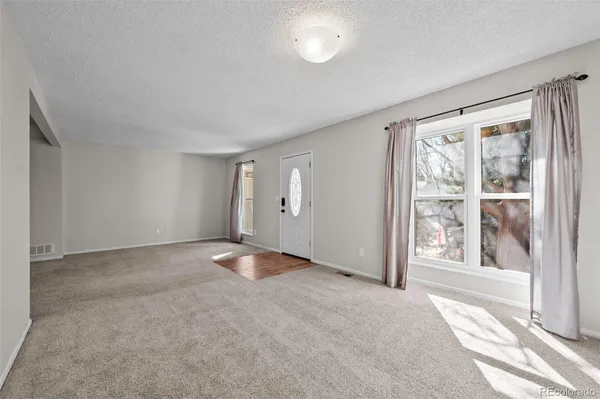 a bathroom with a sink a vanity and a mirror