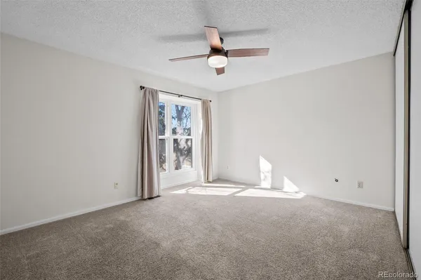 a view of a backyard with wooden floor