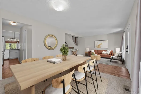 a view of an empty room with a fireplace and a window