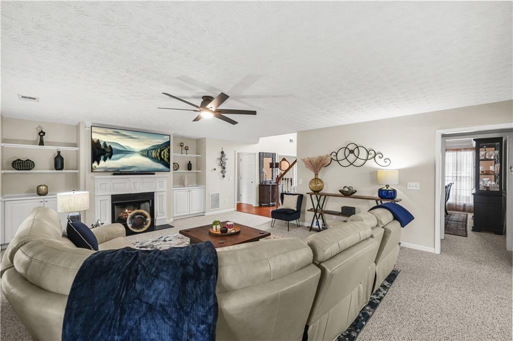 4320 Clarion Drive Conley, GA 30288 - Photo 13 of 49 a living room with fireplace furniture and a fireplace