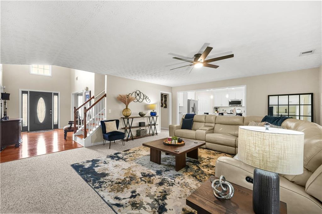 4320 Clarion Drive Conley, GA 30288 - Photo 15 of 49 a living room with furniture and wooden floor