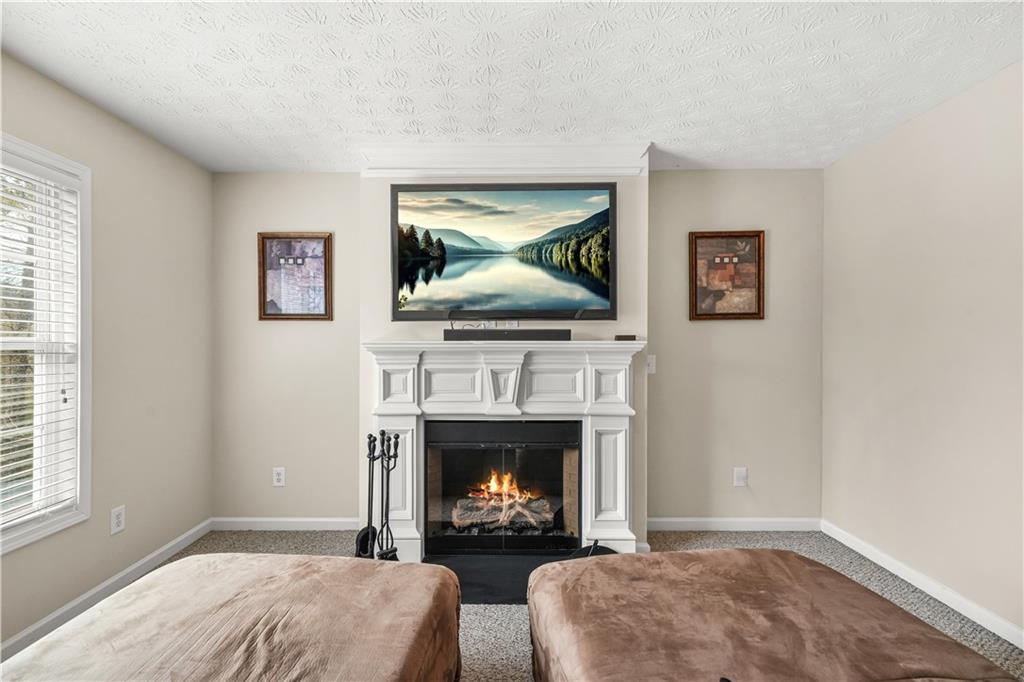 4320 Clarion Drive Conley, GA 30288 - Photo 27 of 49 a living room with furniture and a fireplace