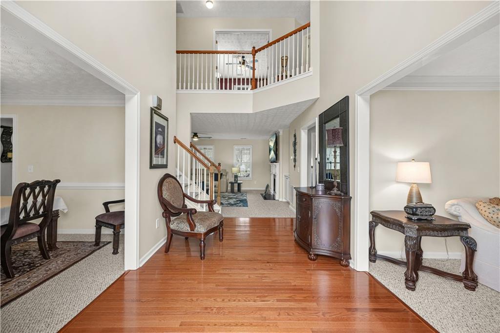4320 Clarion Drive Conley, GA 30288 - Photo 8 of 49 a living room with fireplace furniture and a wooden floor