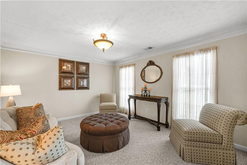 4320 Clarion Drive Conley, GA 30288 - Photo 9 of 49 a living room with furniture and a window