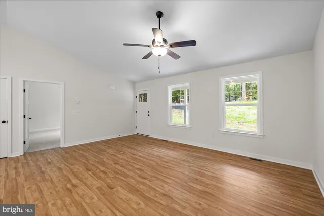 a kitchen with a sink and a window