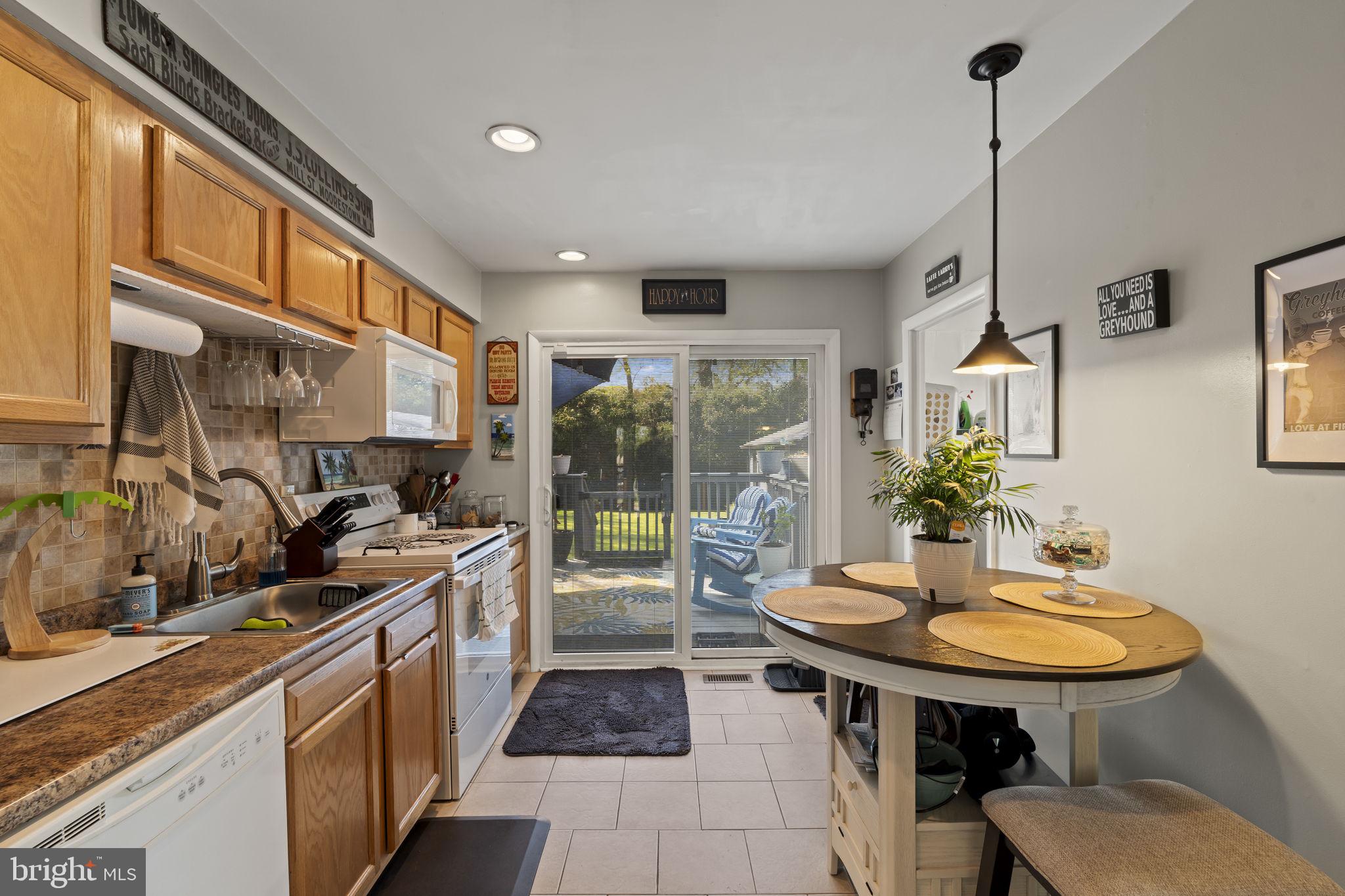 436 Carver Avenue Lawnside, NJ 08045 - Photo 11 of 32 a kitchen with sink and view of living room